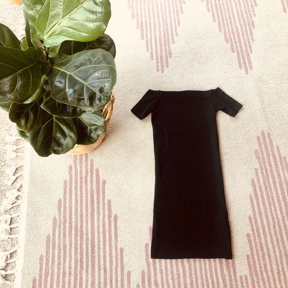 Sexy, black, off the shoulder dress.